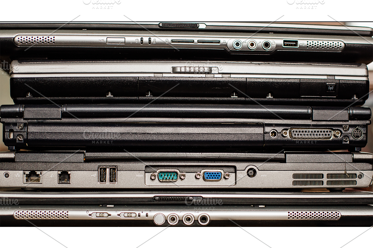 old laptop computers bundle, a Technology Photo by VetalStock (Photo 4 of 7)