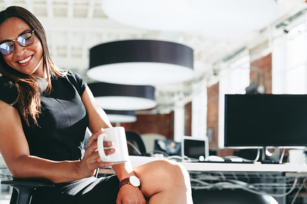 Enjoying a coffee break in the office, a Person Photo by Jacob Lund