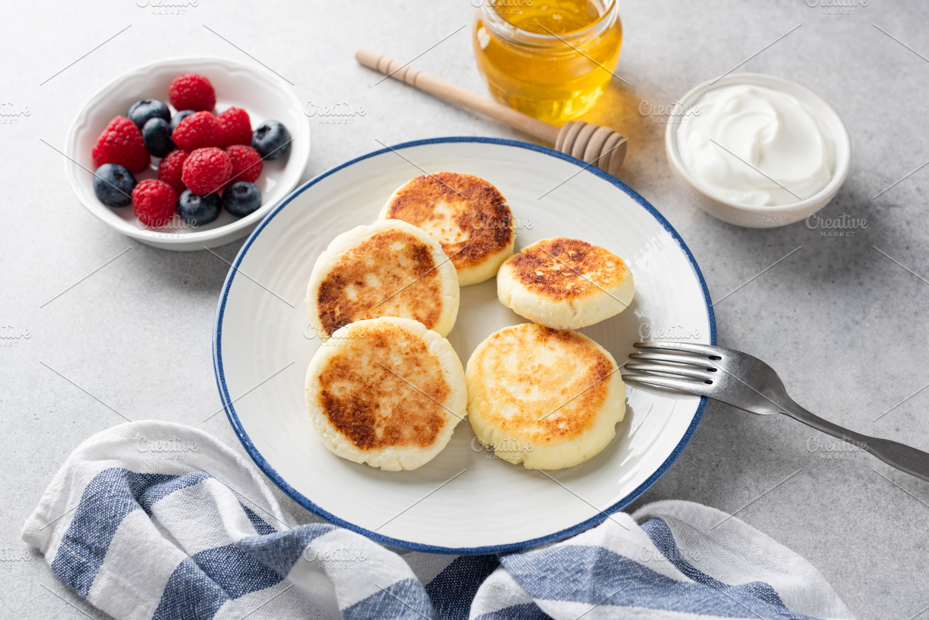 Cottage cheese fritters with berries, a Food & Drink Photo by The baking man