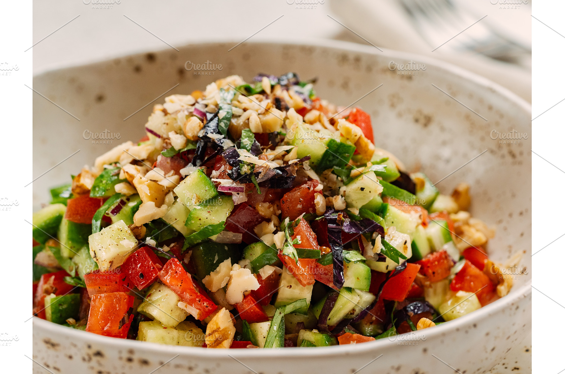 Fresh vegetable salad with walnuts, a Food & Drink Photo by Fascinadora