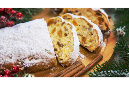 Stollen Christmas cake on the table, a Holiday Photo by yanadjana