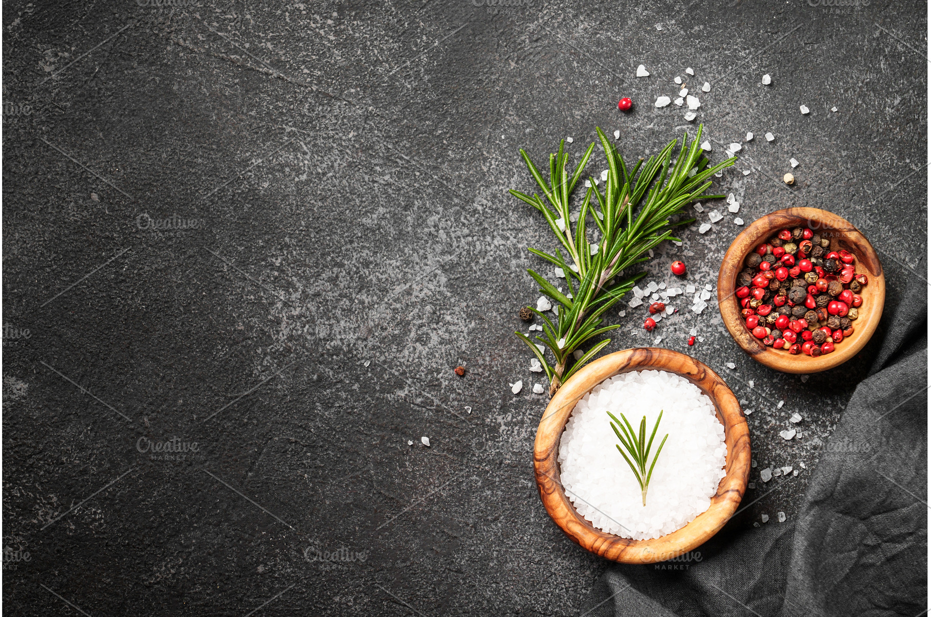 Spices and herbs at black top view., a Food & Drink Photo by Nadia-nb