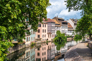 Riverside view with colorful houses in Strasbourg France, an Architecture Photo by GoodGoods