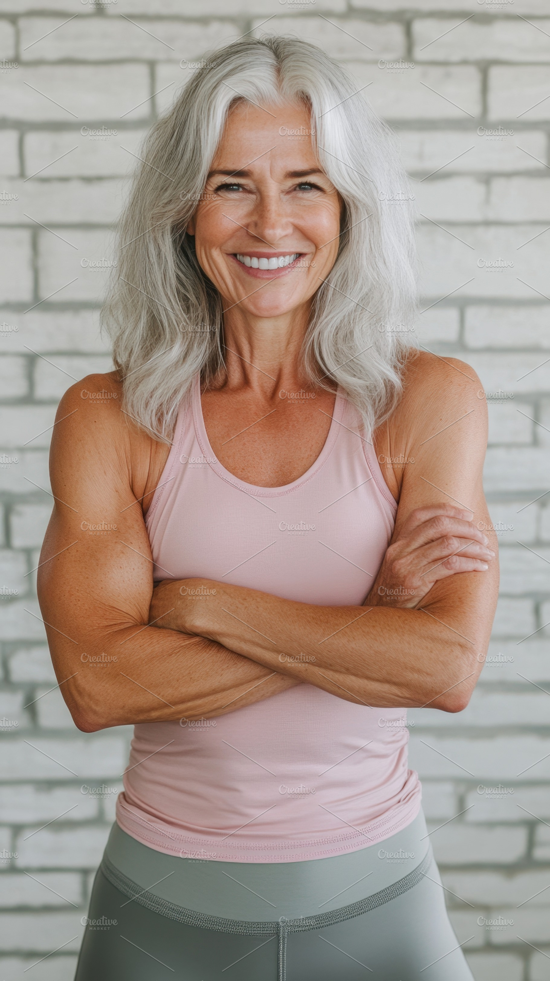 Smiling woman with crossed arms, a Photo by Beautiful things