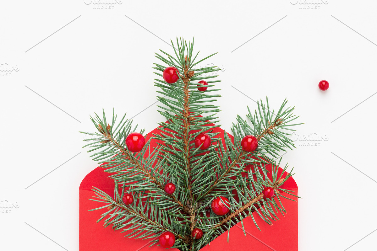 Christmas tree symbol in red envelop featuring christmas tree, envelope, and, a Holiday Photo by Julia Manga (Photo 2 of 2)