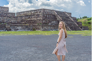 Female tourist standing in front of, a Person Photo by Elizaveta Galitskaya