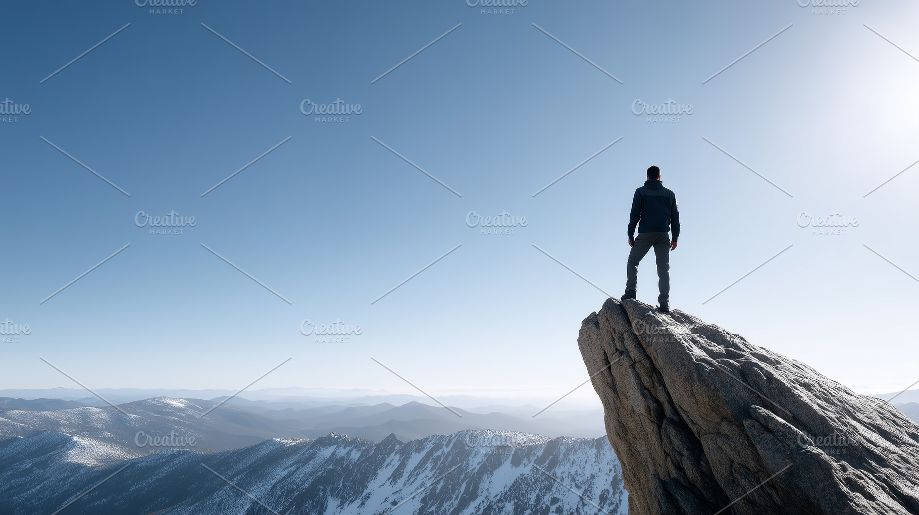 Lone hiker standing triumphantly on, a Sports & Recreation Photo by MistyDay