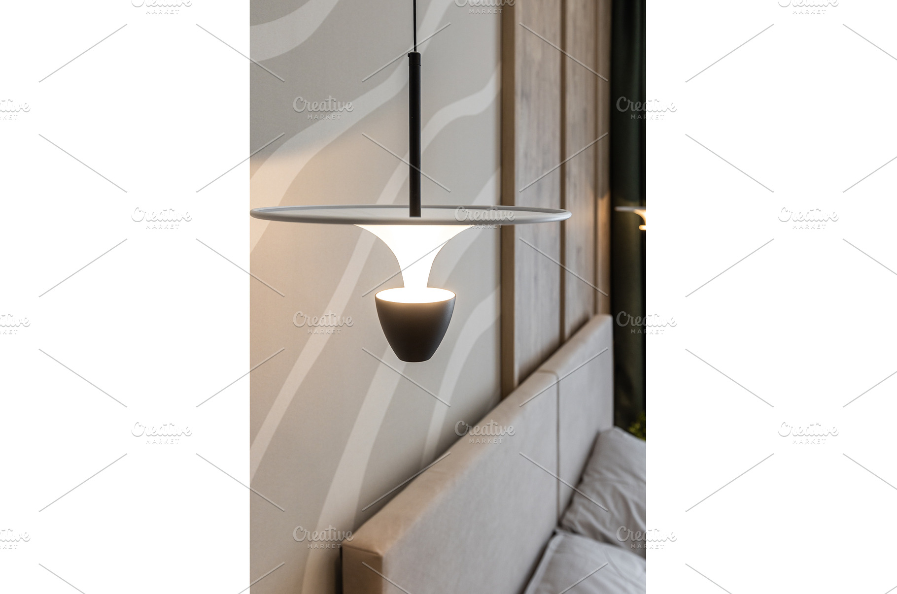 Modern pendant lamp above cozy bed, a Background Photo by wip3out