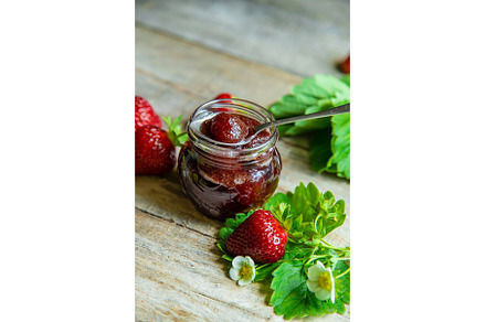 Homemade strawberry jam in a jar, a Food & Drink Photo by yanadjana