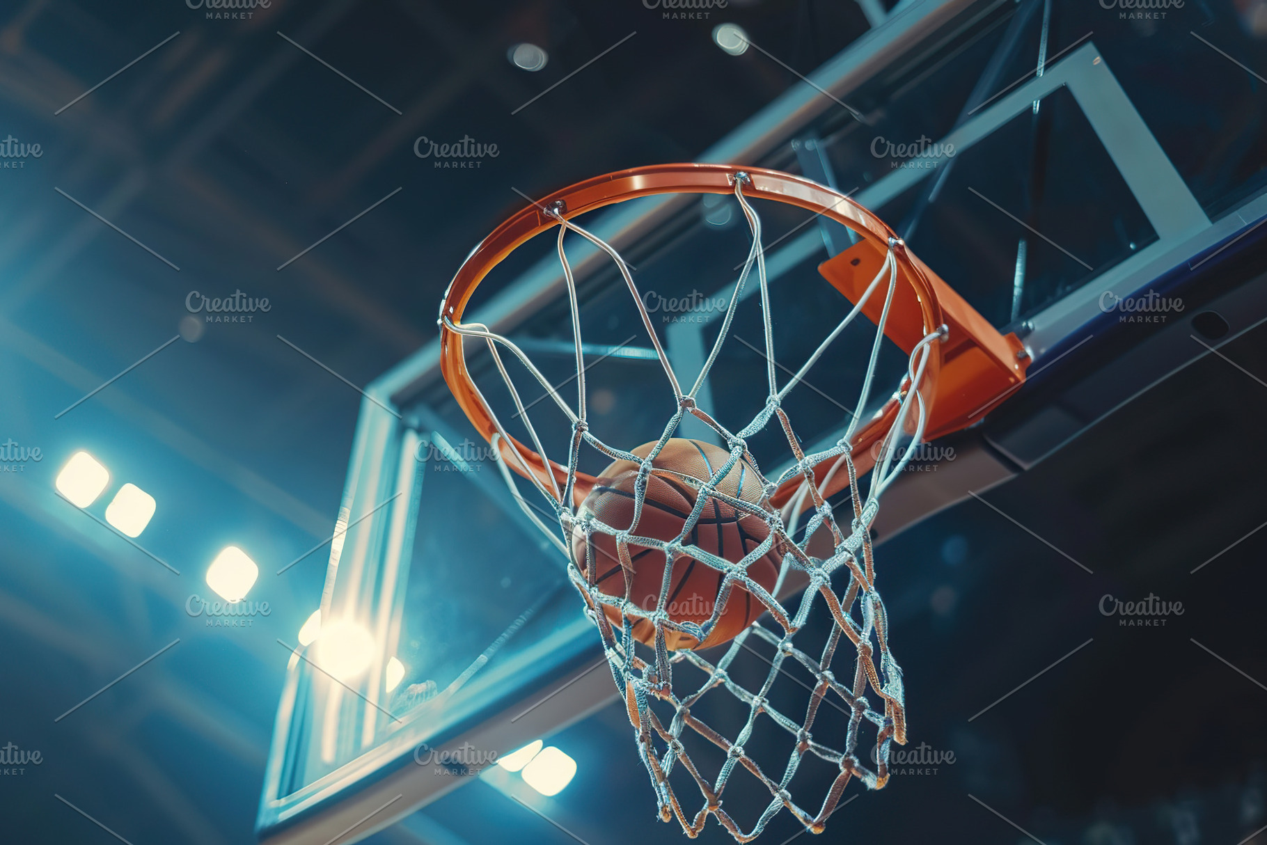 Basketball ball falling into the basketball hoop on basketball a, a Sports & Recreation Photo by AlyaAnd