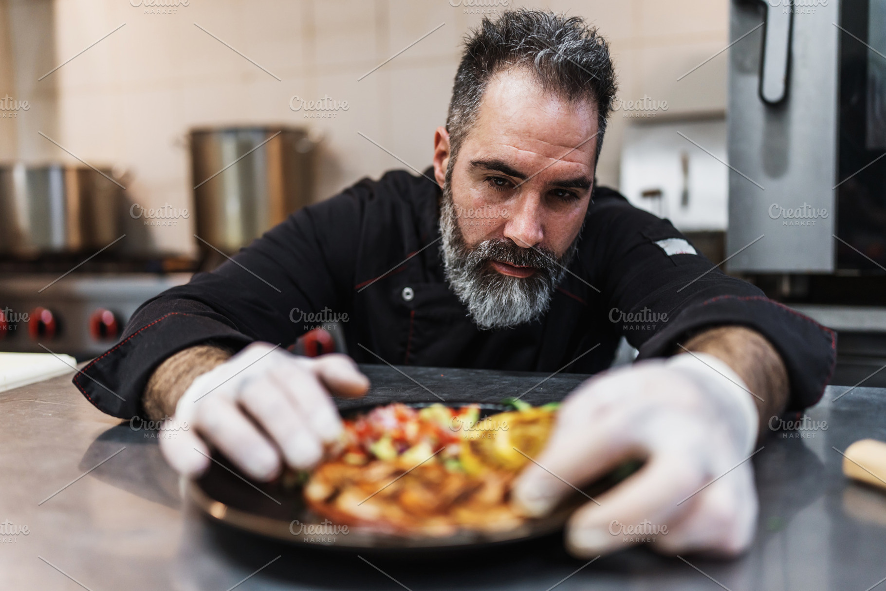 Professional chef preparing food, a Person Photo by REDDOT Studio