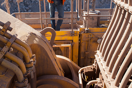 Excavator inspection mining featuring glove, occupation, and protective