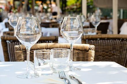 Table for two in a restaurant terrace in summer