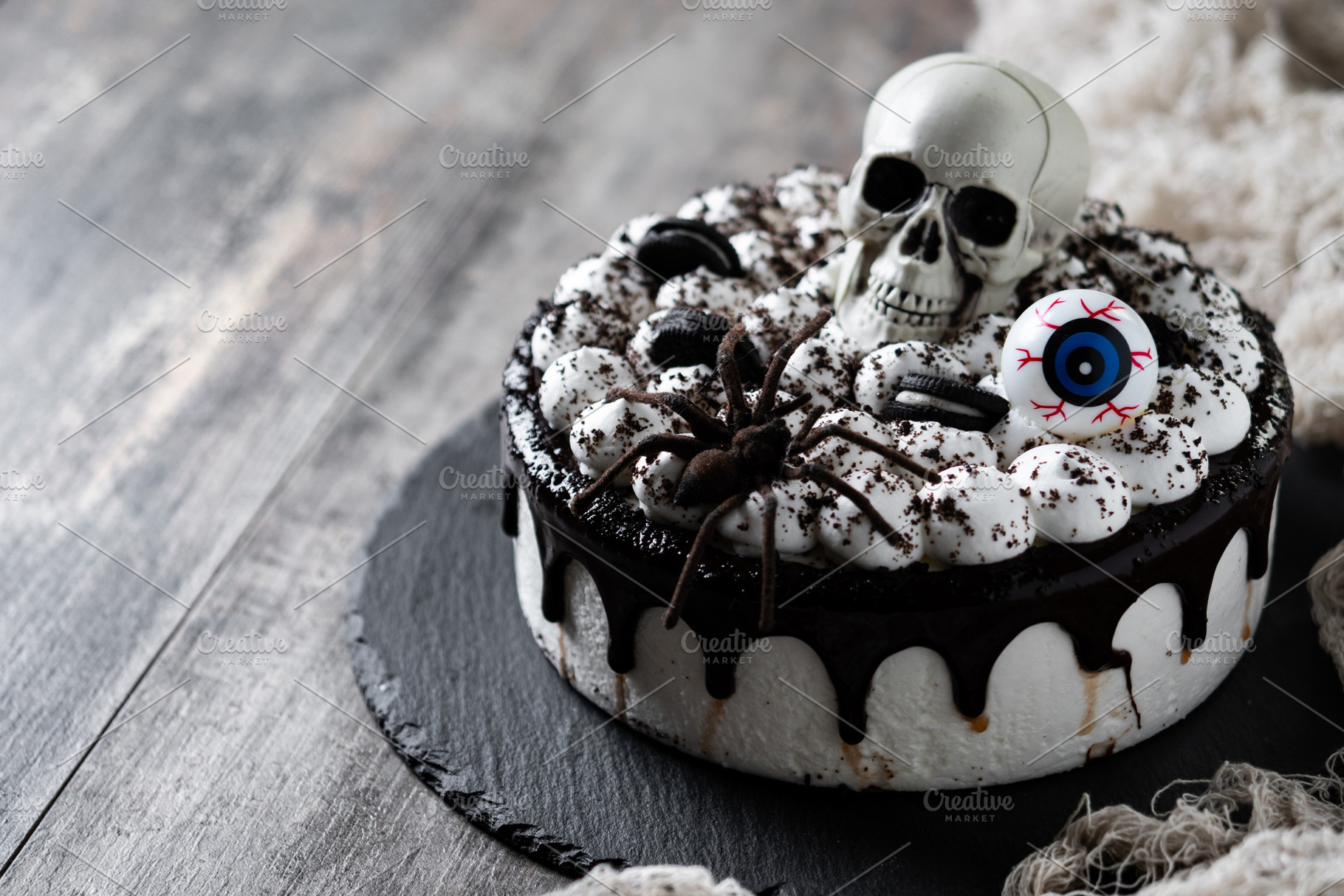 Spooky Halloween chocolate Cake with Skull, Eyeball, and Spider Decoration, a Food & Drink Photo by etorres69