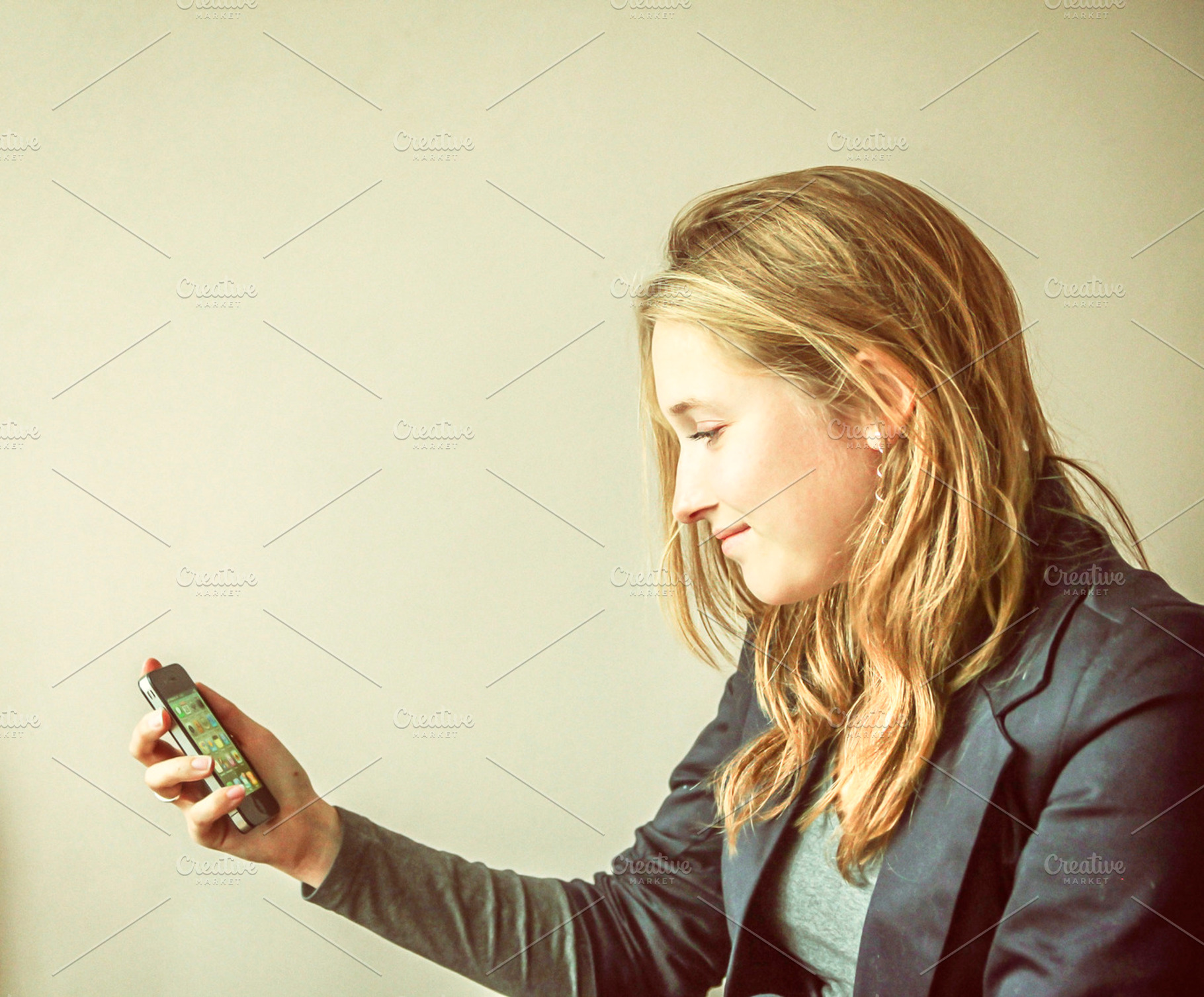 Young woman with touch screen phone