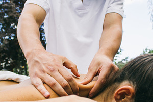 Physiotherapist treating a patient stock photo containing physiotheraphy and