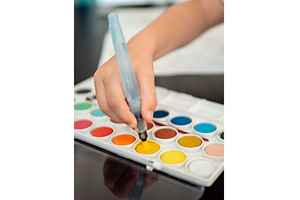 Boy draws with watercolors and, a School & Education Photo by Fascinadora