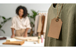 Clothing tag close up in sustainable, a Beauty & Fashion Photo by Igor Tichonow