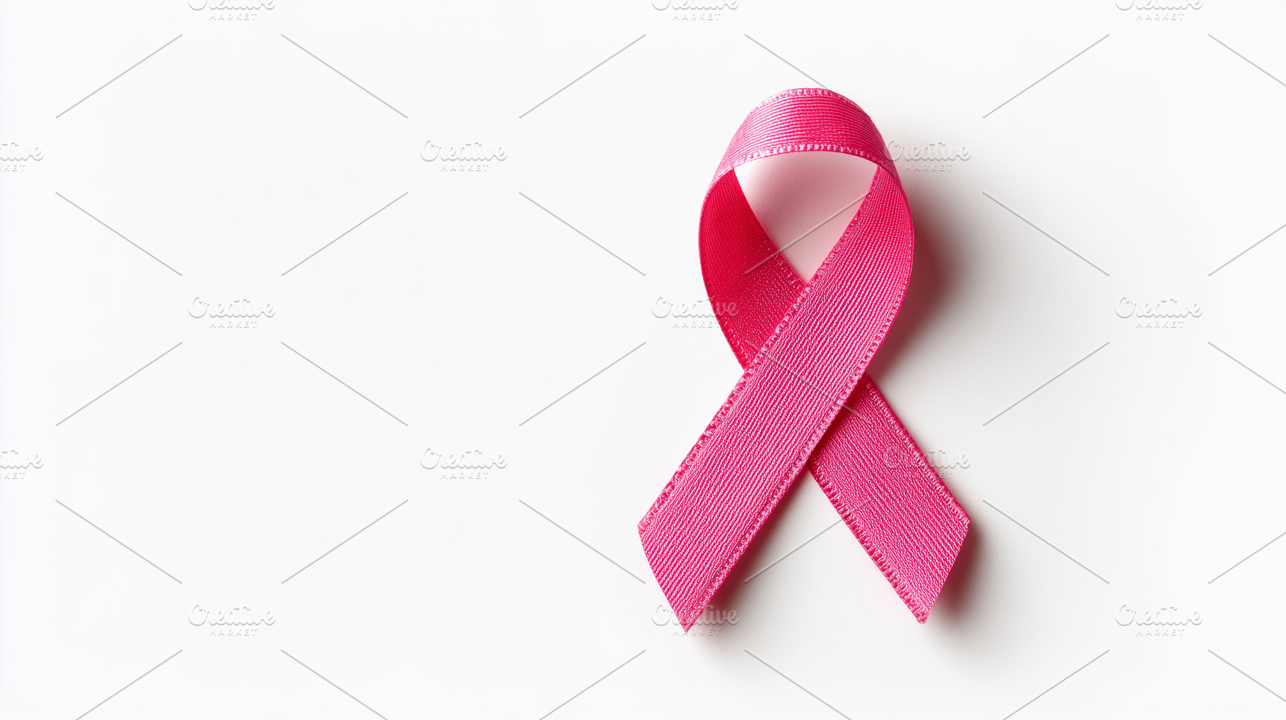 Pink ribbon on white background, a Health & Medical Photo by MistyDay