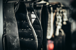 Various Lifting Belts On Rack At Gym