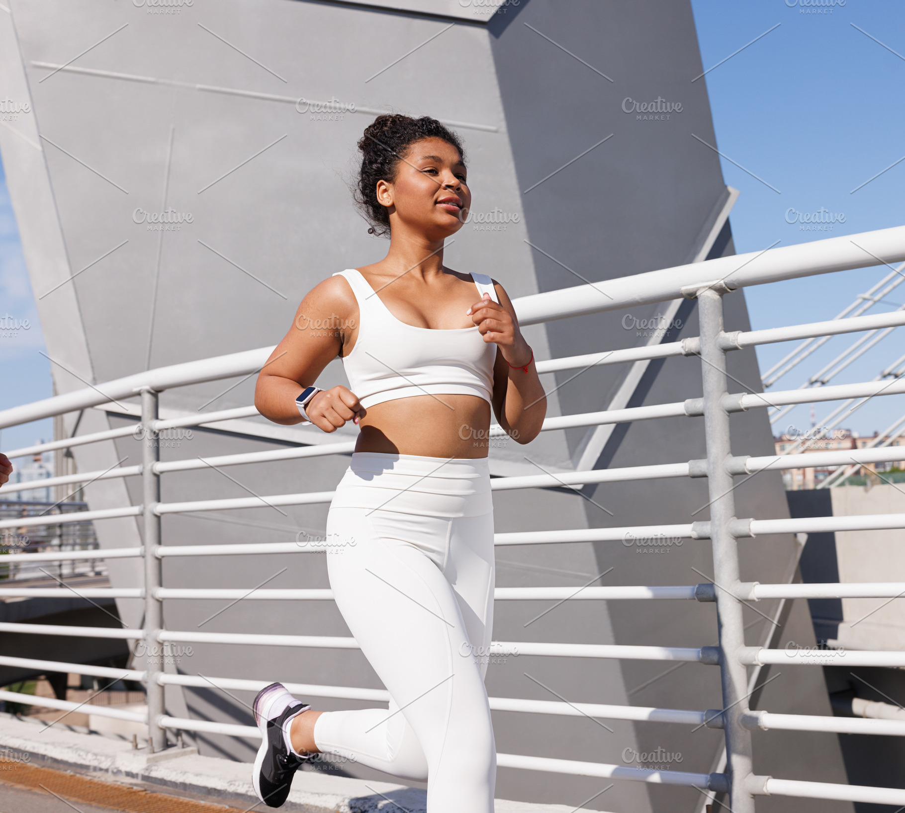 Young woman in white sportswear, a Sports & Recreation Photo by Artem Varnitsin