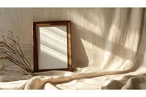 Wooden photo frame with dried flower, a Background Photo by piter.goskov