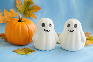 Cute ghost-shaped decorations with a, a Photo by Tanuart