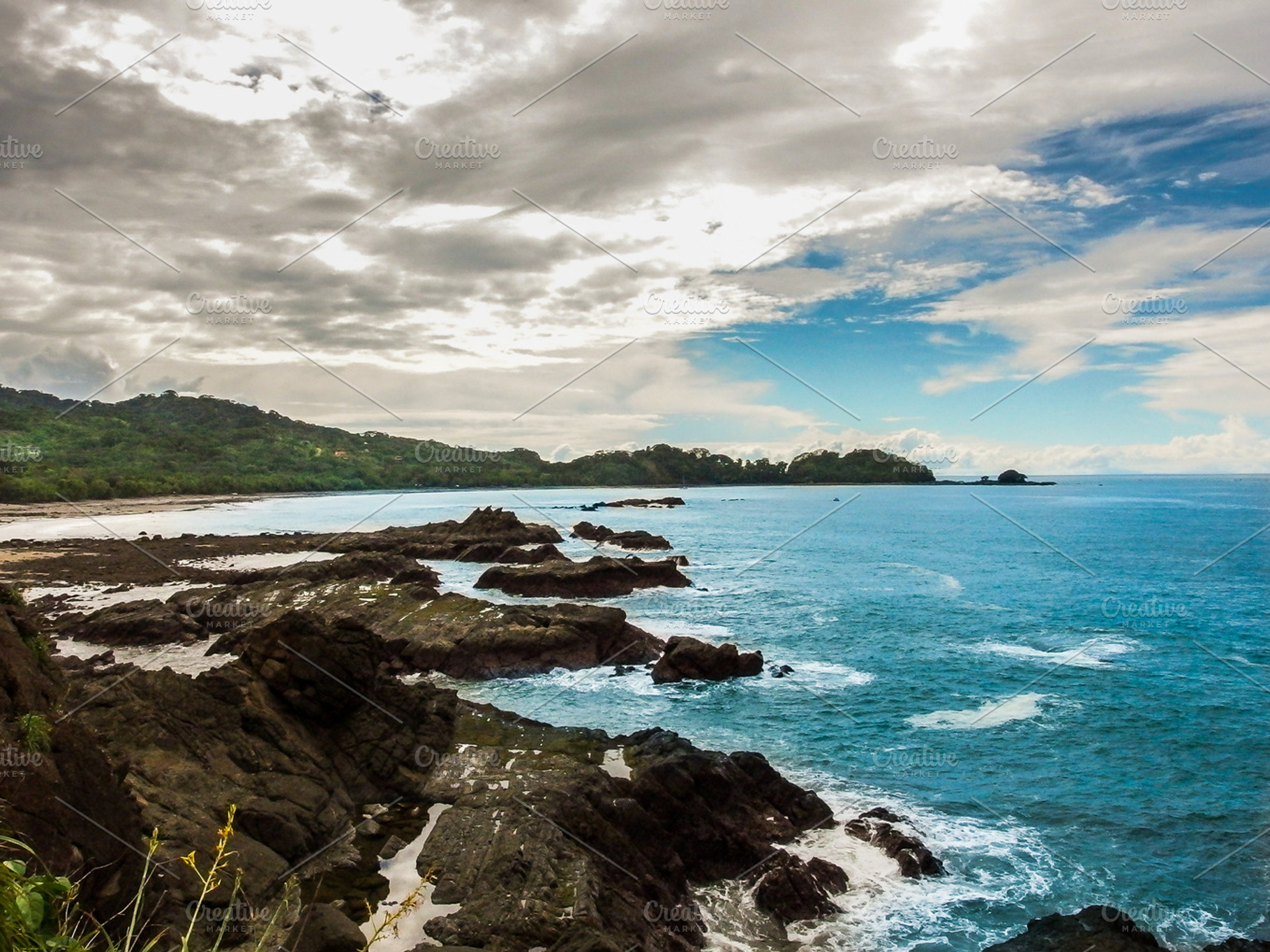 Rocky Coastline with isle & blue sea, a Nature Photo by Nex Apher