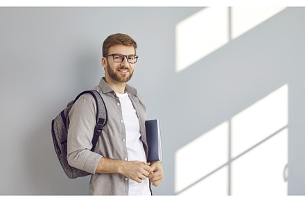 Portrait of a smiling adult male, a Person Photo by StudioRomantic