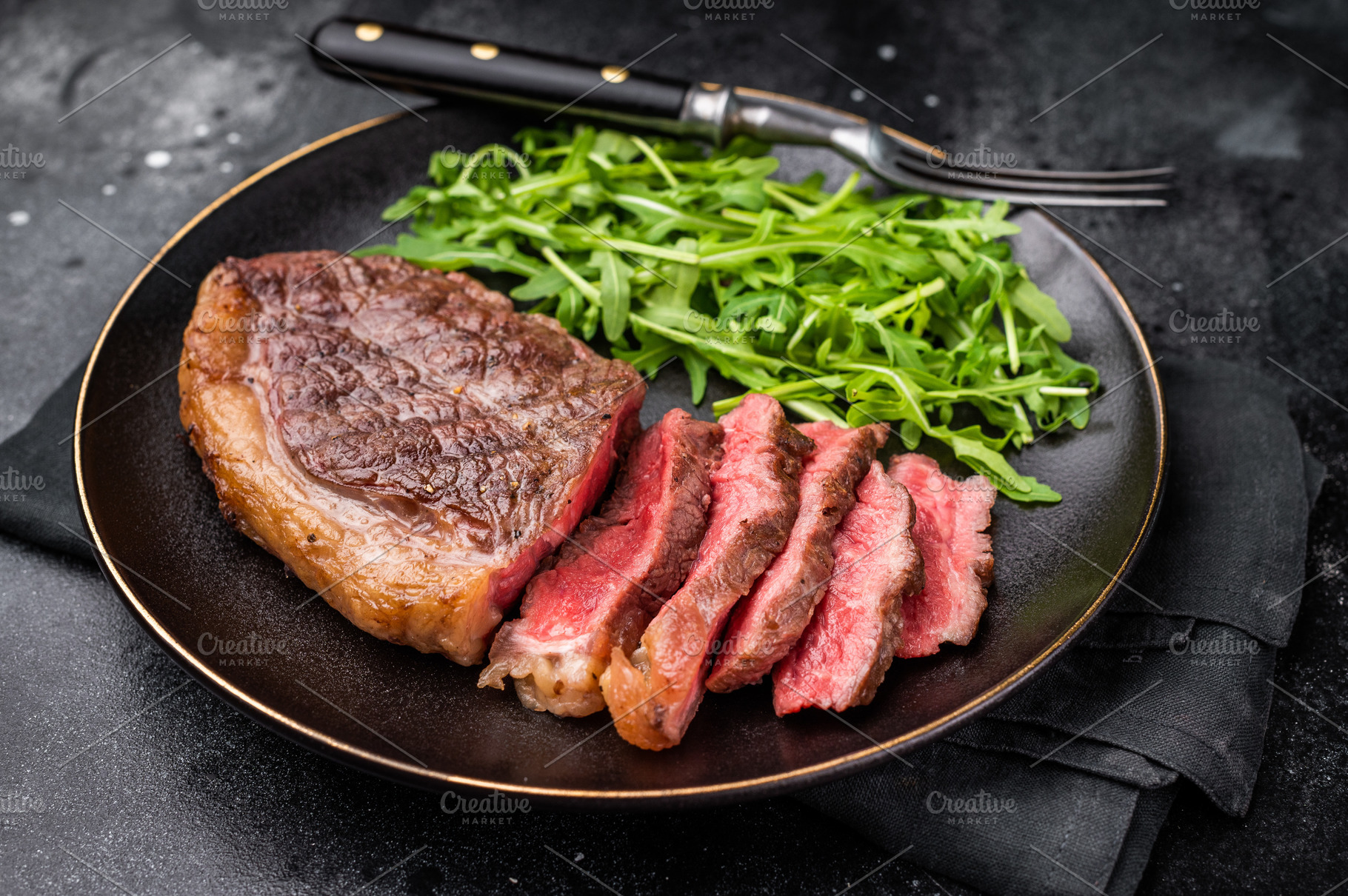 Appetizing grilled striploin steak with salad, inviting you to i, a Food & Drink Photo by composter-box@mail.ru