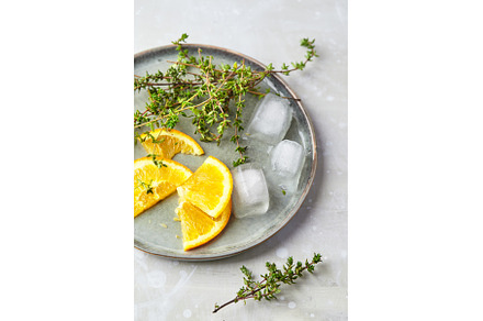 Orange slices, thyme sprigs and ice, a Food & Drink Photo by Irina Burakova