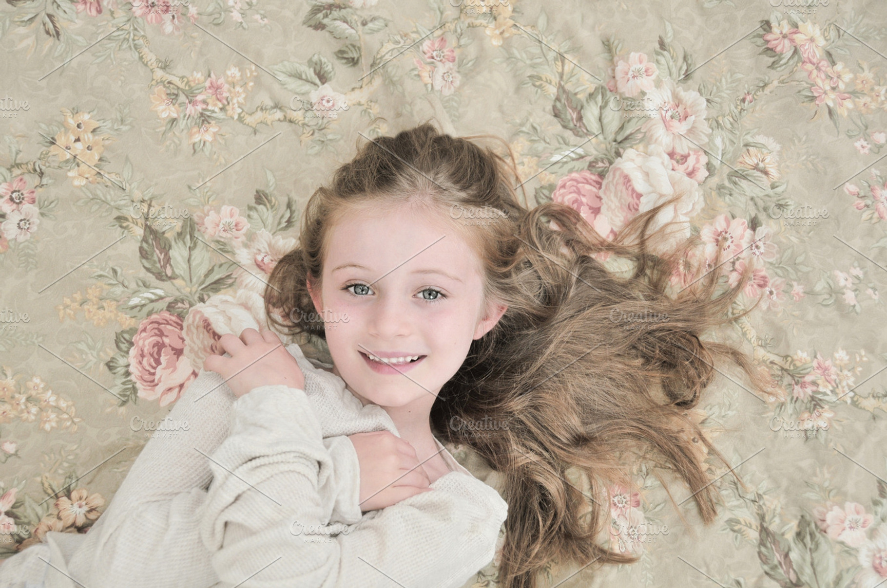 Lovely Girl on Floral Print, a Person Photo by Carolyn Sandstrom Art
