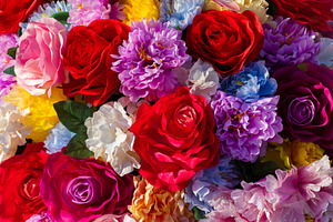 Bright, colorful assortment of artificial flowers in full bloom,, a Nature Photo by Ales Munt