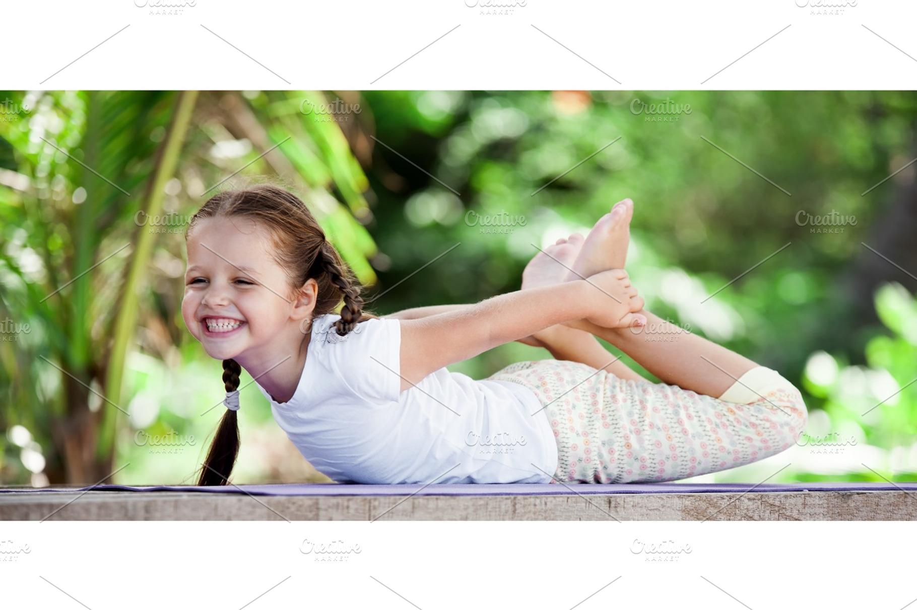 Child doing exercise on platform outdoors healthy lifestyle yoga girl, a Person Photo by Jyliana's shop