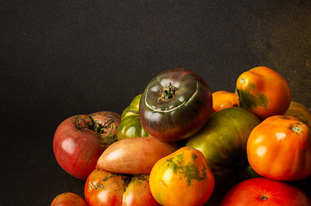 Tomatoes of different varieties, a Food & Drink Photo by Pandateam