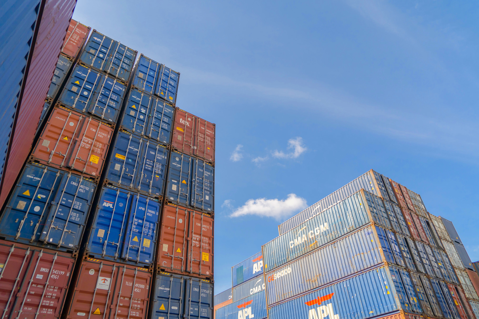 Shipping container site loading by crane in logistic port wareho, a ...