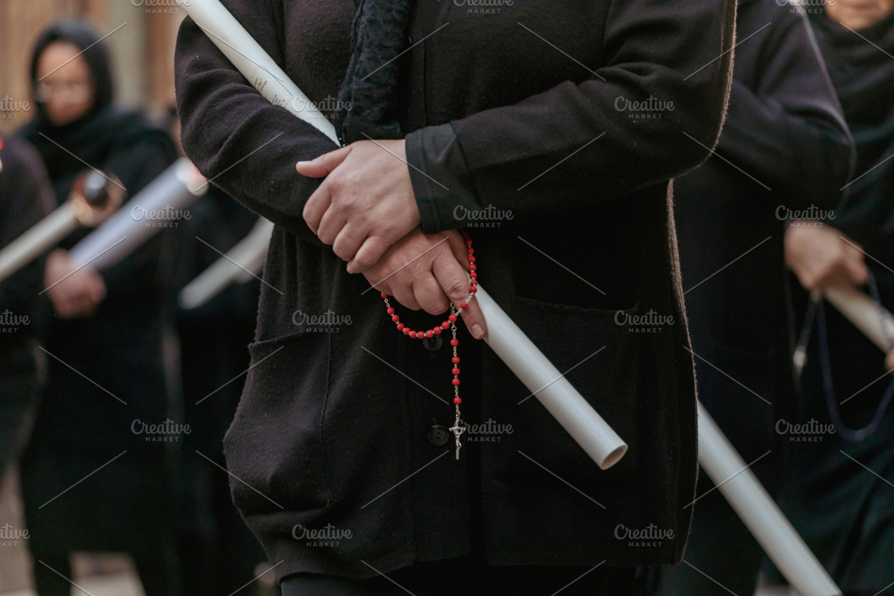 Woman Holding Candle and Rosary During Good Friday Procession in Italy, a Holiday Photo by Antonio Gravante Market