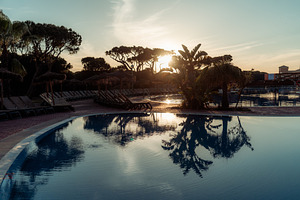 Sunset at Punta Umbria resort pool, a Sports & Recreation Photo by SkyNext