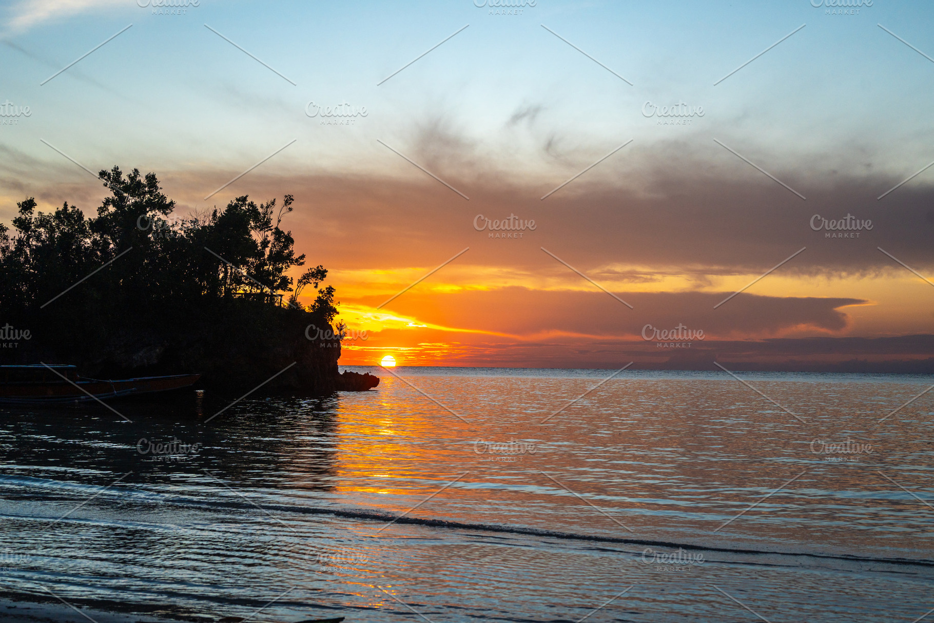 Sunset on Lia beach, Waleakodi Island, Togian archipelago, Sulaw, a Nature Photo by GoodGoods