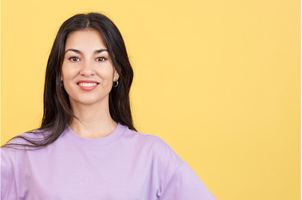 Happy woman looking at the camera, a Person Photo by Iván Moreno STOCK PHOTO