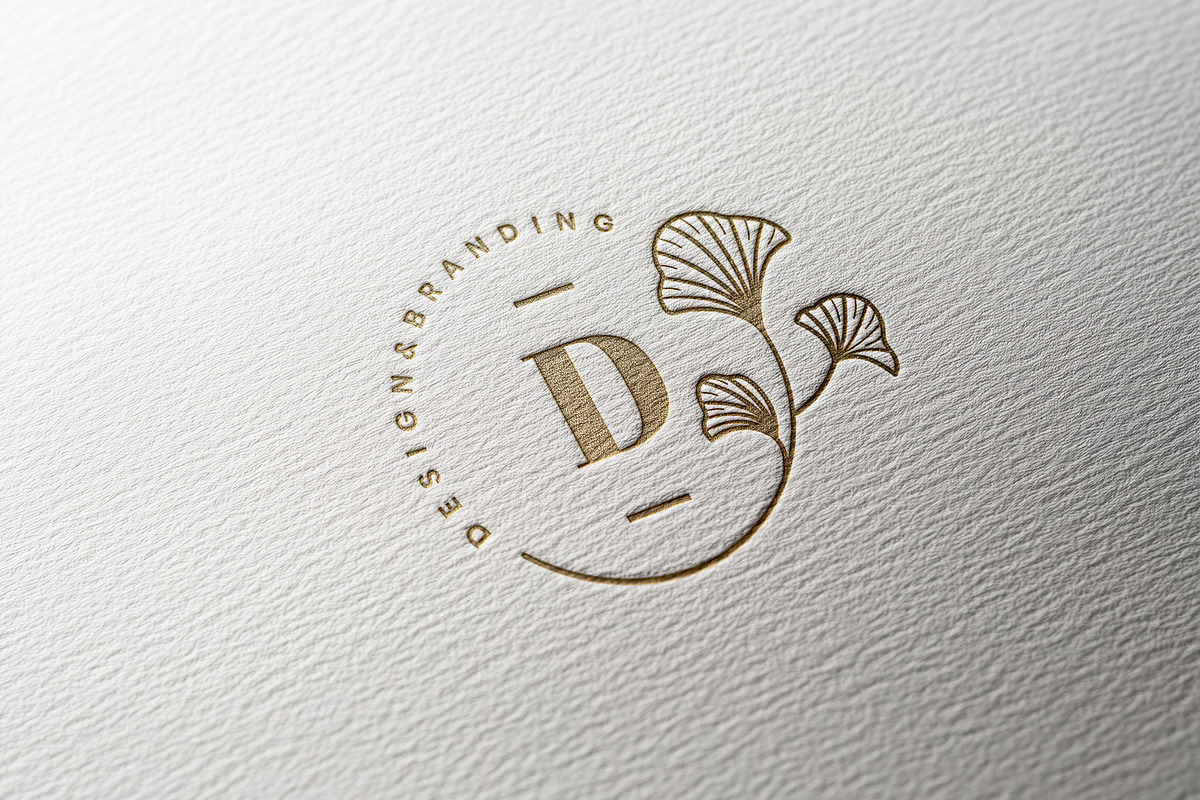 Gold Logo Mockup, a Mockup by Design Squad (Photo 2 of 4)