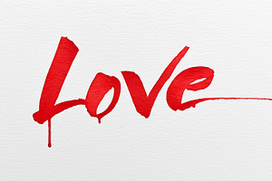 Red watercolor word love painted on, a Background Photo by MistyDay