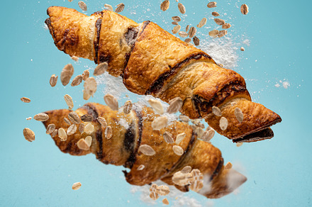 Freshly baked cocoa croissant rolls, a Background Photo by Grafvision photography