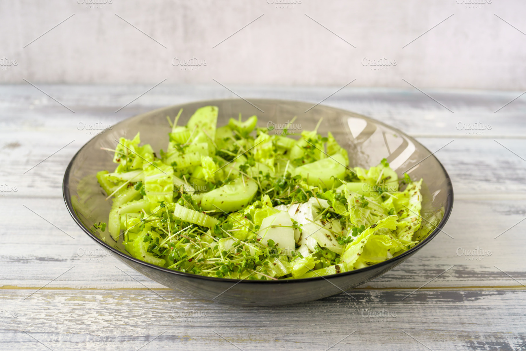 Fresh green microgreen salad on a light blue plate. A natural and organic conce, a Food & Drink Photo by Eugene_Photo