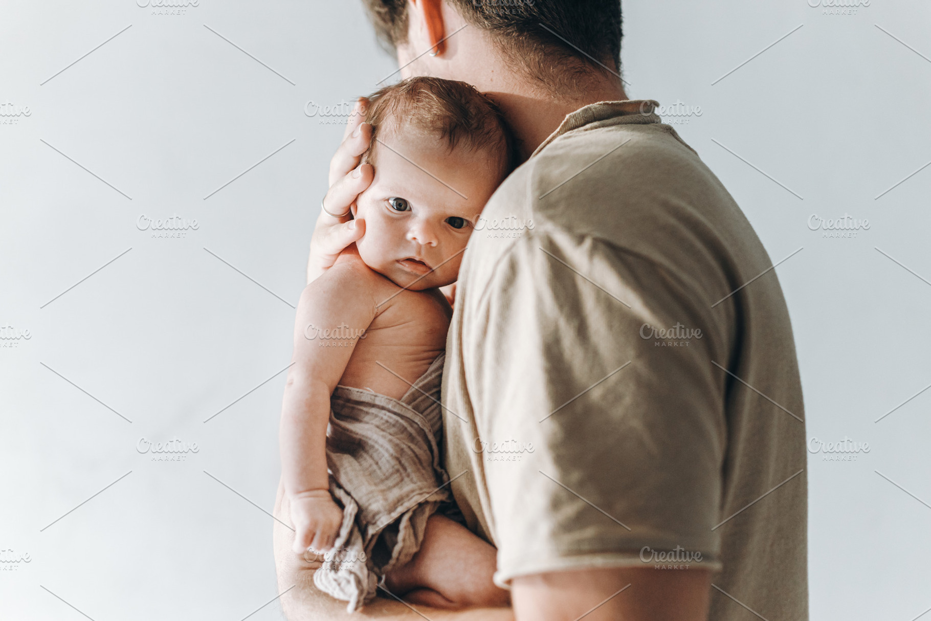 Happy Fathers day!  Stylish father hugging cute little baby son, a Person Photo by Sonjachni