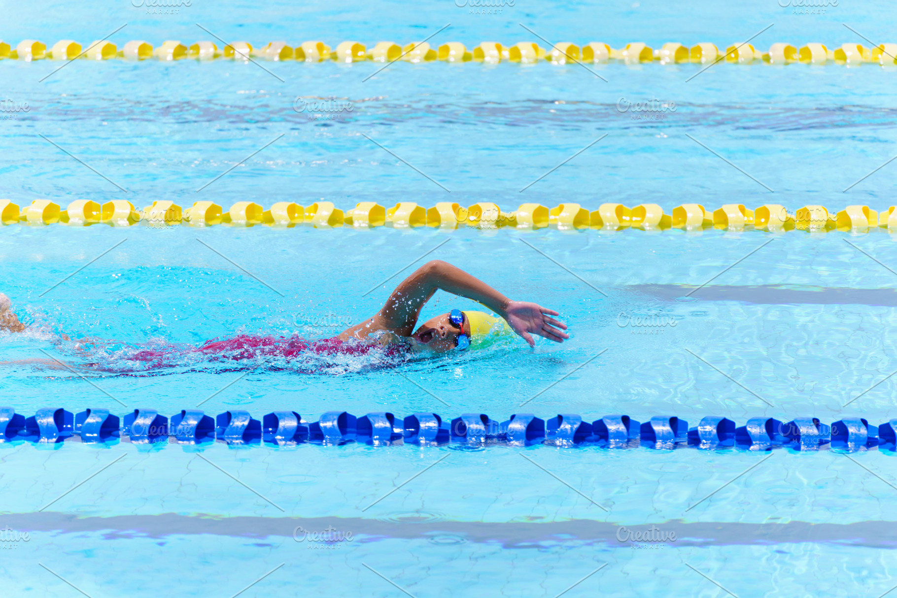 Swimmer child swims freestyle swimmi, a Sports & Recreation Photo by Casanowe-studio
