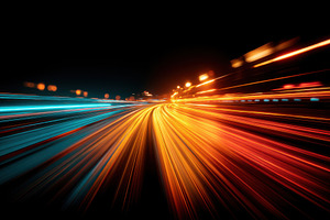 High-speed light trails on curved highway, a Wallpaper Photo by AlyaAnd