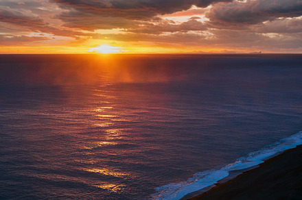 Picturesque autumn evening view to endless ocean  black volcanic, a Nature Photo by YuriyB