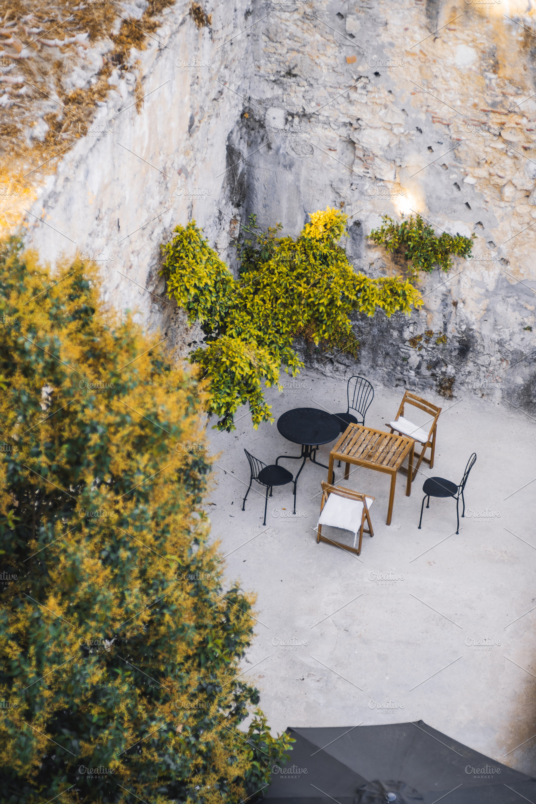 Rustic outdoor patio seating, a Food & Drink Photo by SkyNext