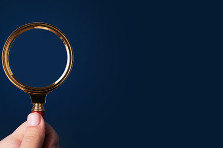 magnifier in hand panoramic, a Business Photo by Ales Munt
